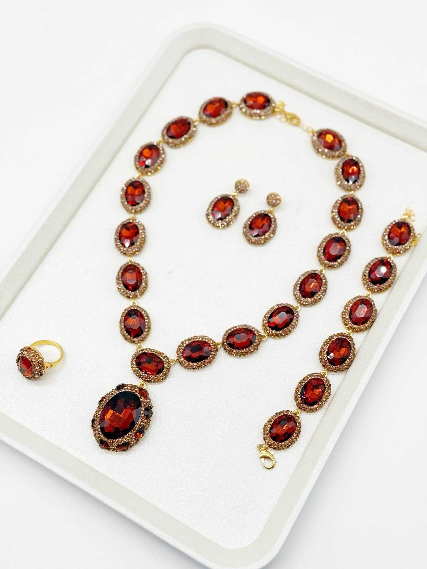 Parure per donna collana bracciale anello orecchini rosso rubino cristalli dorato vintage
