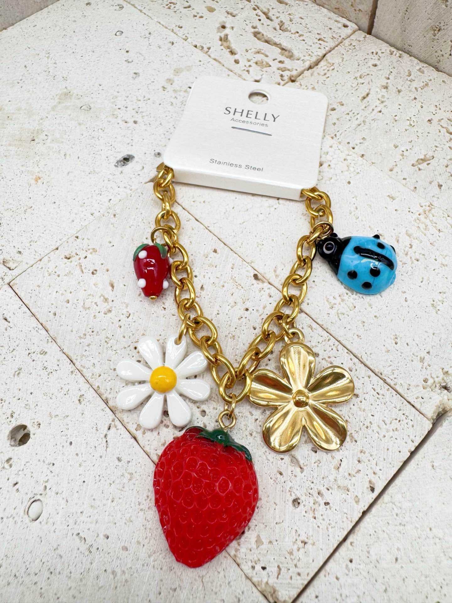 Bracciale in acciaio dorato per donna stile pop estate fragola coccinella margherita
