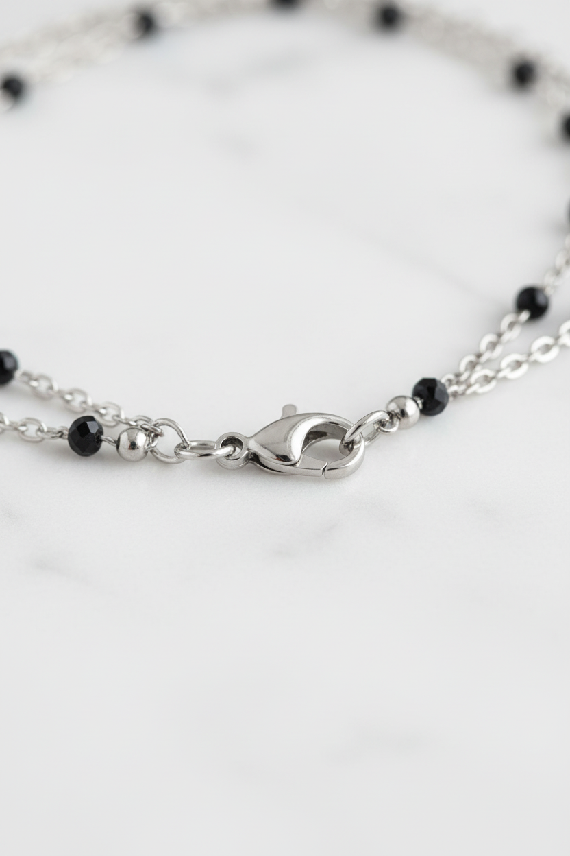 Dettaglio perline nere cristallo