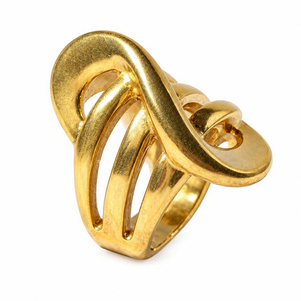 Anello donna in acciaio misura 18 con design scultoreo aperto e finitura oro.