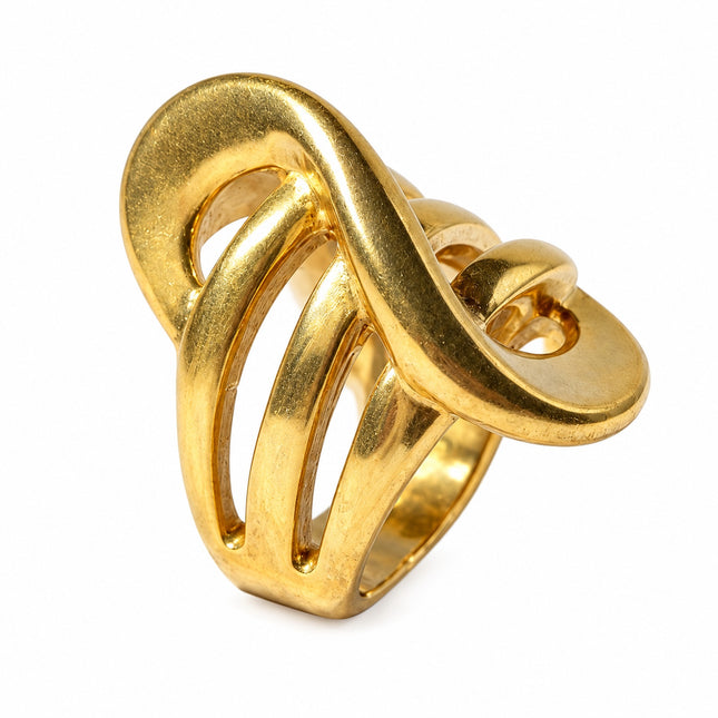 Anello donna in acciaio misura 18 con design scultoreo aperto e finitura oro.