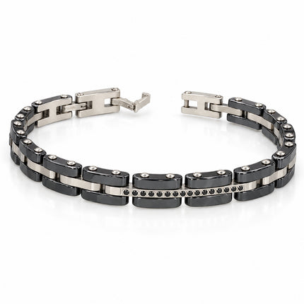 Vista prospettica del bracciale nero e color argento con chiusura aperta.