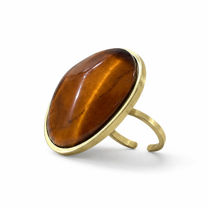 Anello Shelly dorato con occhio di tigre ovale, vista a tre quarti della montatura.