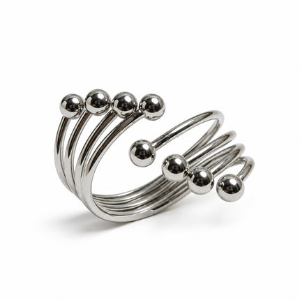 Anello donna acciaio argento a spirale con sfere, vista a tre quarti.