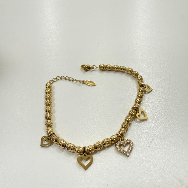 Bracciale donna con cuori pendenti – Dorato – Elegante con dettagli in strass