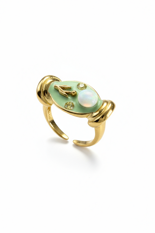 Anello donna in acciaio con piastra ovale smaltata verde e micro dettagli decorativi