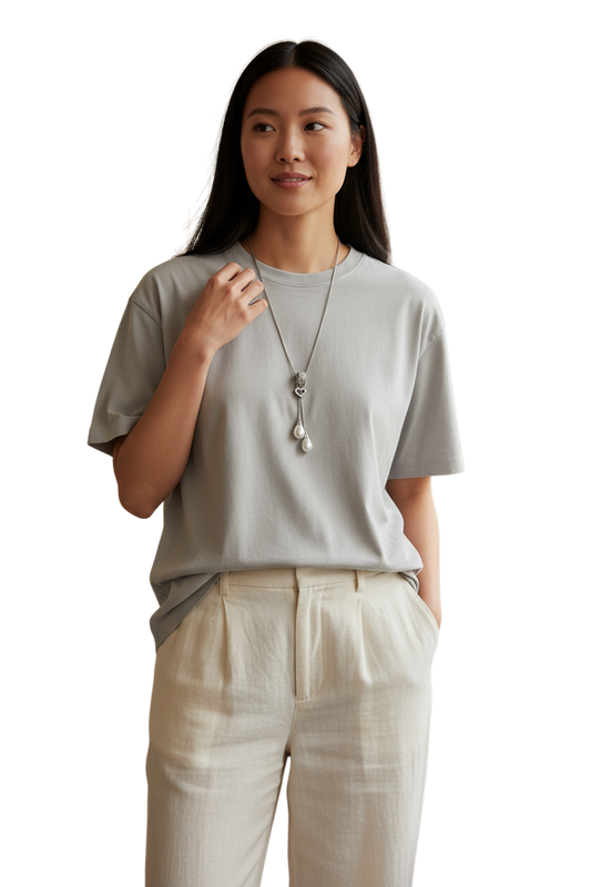 Collana lunga donna acciaio 316L con pendente cuore e perle bianche