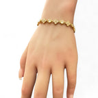 Oro con cristalli bianchi e charms a fiore