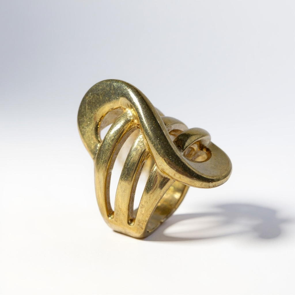 Anello donna acciaio misura 18 design scultoreo aperto finitura oro