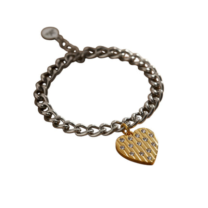 Dettaglio charm oro