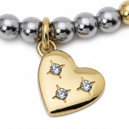 Dettaglio macro ciondolo cuore gold con cristalli a stella bracciale 2JEWELS 232347