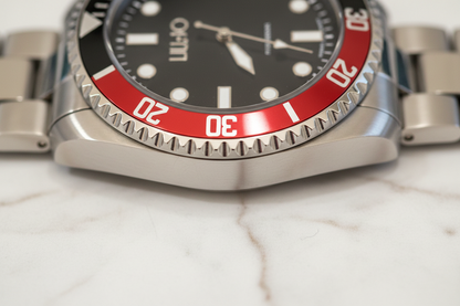 Dettaglio ghiera bicolore nero rosso