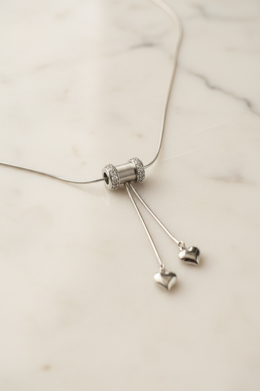 Meccanismo saliscendi regolabile