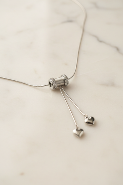 Meccanismo saliscendi regolabile