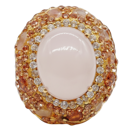 Tempo A Tempo adjustable gold-plated copper ring with white cabochon stone and champagne-colored rhinestones.