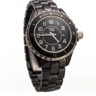 Tempo A Tempo Armada Nueva black ceramic watch with a black analog dial, silver numerals, and a date display window.