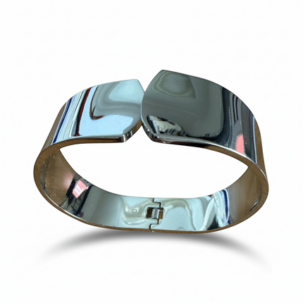 Tempo A Tempo silver and gold stainless steel minimalist cuff bracelet with polished finish.