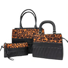 Tempo A Tempo set of 3 black leather bags with leopard print panels and quilted details. Includes tote, handbag, and clutch.