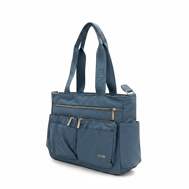 Tempo A Tempo blue nylon tote bag with multiple pockets and logoed handles.