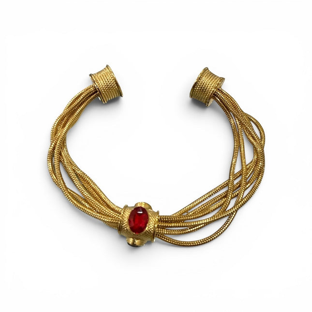 Bracciale multifilo Tempo A Tempo in acciaio dorato con pietra centrale rossa, design elegante e chiusura magnetica