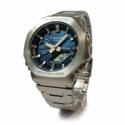 Tempo A Tempo Casio G-Shock men's stainless steel analog-digital watch with blue dial, WR 20 BAR, shock-resistant.