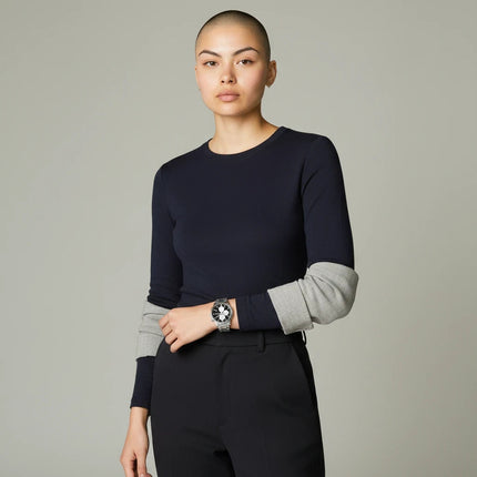 Tempo A Tempo Casio men's stainless steel chronograph watch with black dial and date display worn on a model's wrist.