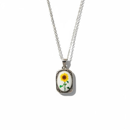 Collana Tempo A Tempo in acciaio con ciondolo rettangolare smaltato raffigurante un girasole su sfondo bianco