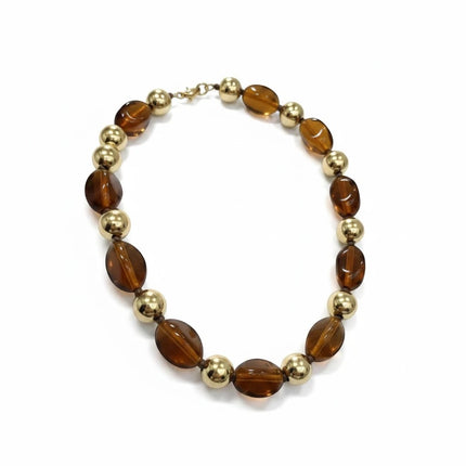 Tempo A Tempo collana girocollo donna con pietre ambra sfumate e sfere dorate, montatura oro.