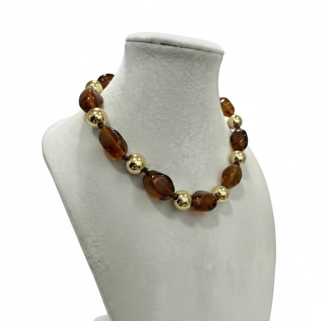 Tempo A Tempo Collana girocollo da donna con pietre ambra trasparenti e sfere dorate su montatura oro.