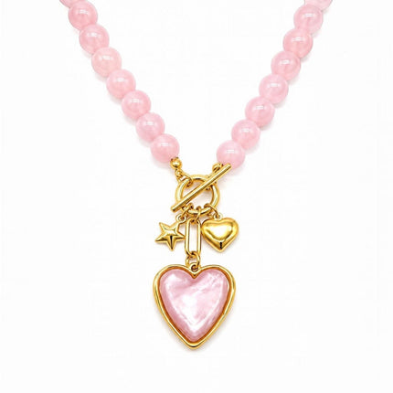 Collana Tempo A Tempo rosa con perline in resina, chiusura T-bar dorata e ciondoli a forma di cuore e stella