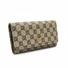Tempo A Tempo Coveri World beige trifold wallet with monogram pattern and gold logo detail