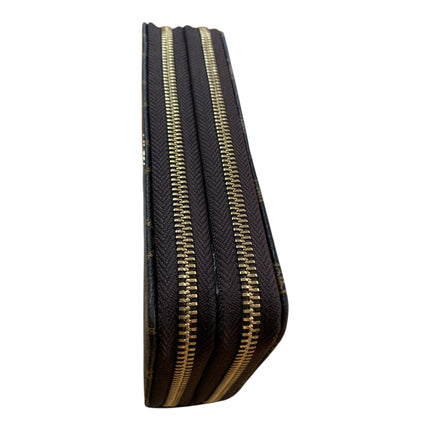 Tempo A Tempo Enrico Coveri brown coffee faux leather wallet featuring a double gold zip closure and side view