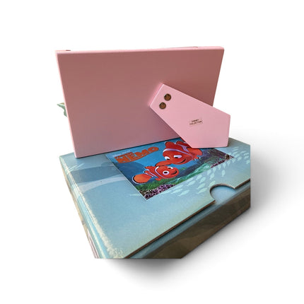 Tempo A Tempo Disney Pixar Finding Nemo photo frame in pink with Nemo and Dory characters, back view with stand.