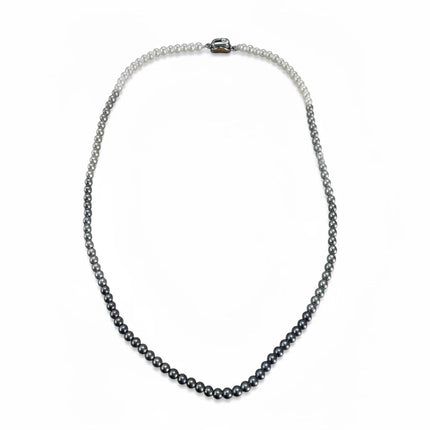 Tempo A Tempo Shelly necklace featuring a gradient of white to dark grey glass pearls with a stainless steel clasp.