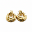 Tempo A Tempo gold-tone stainless steel vintage chic domed hoop earrings with a polished mirror finish.
