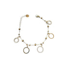 Tempo A Tempo gold-tone steel bracelet with geometric charms, some with cubic zirconia.