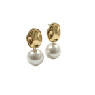 Tempo A Tempo gold hammered abstract drop earrings with large white pearls and small silver heart studs.