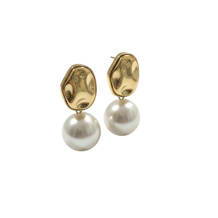 Tempo A Tempo gold hammered abstract drop earrings with large white pearls and small silver heart studs.