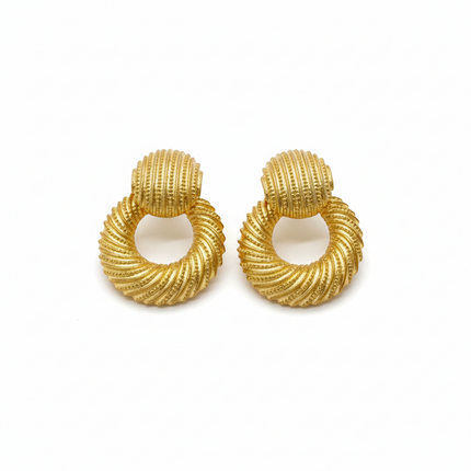 Tempo A Tempo gold multicolor fluted hoop earrings with a vintage modern, statement style. Resin with metallic finish.