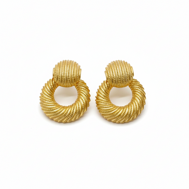 Tempo A Tempo gold multicolor fluted hoop earrings with a vintage modern, statement style. Resin with metallic finish.