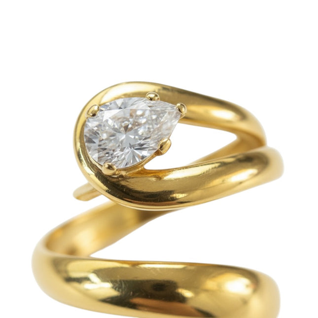 Tempo A Tempo gold-plated steel adjustable ring with a pear-cut pavé zircon set in a coiled snake design.