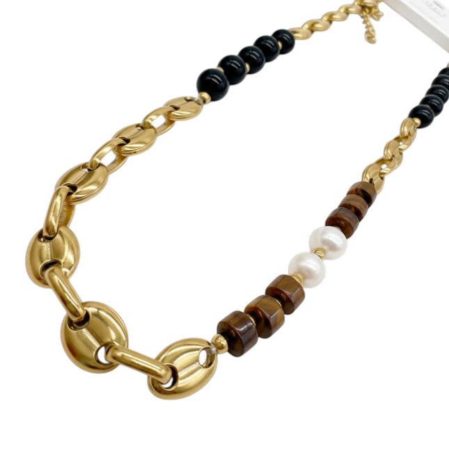 Tempo A Tempo gold chain necklace with tiger eye cubes, black beads, and pearls. Elegant design.
