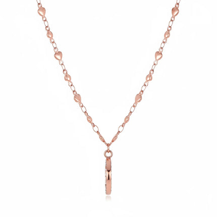 Tempo A Tempo Guess gold-tone stainless steel necklace featuring an intertwined hearts pendant on a delicate chain.