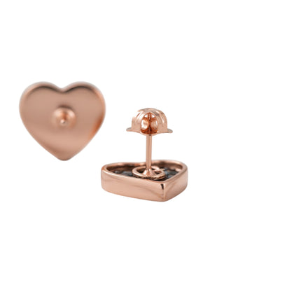 Tempo A Tempo Guess heart-shaped stud earrings in rose gold-tone steel with black accents and crystal details