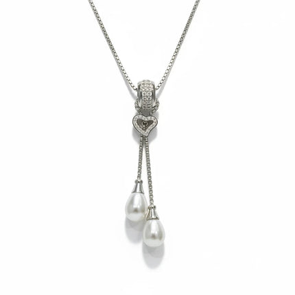 Tempo A Tempo long necklace in 316L stainless steel with a heart pendant, cubic zirconia, and two white pearls.