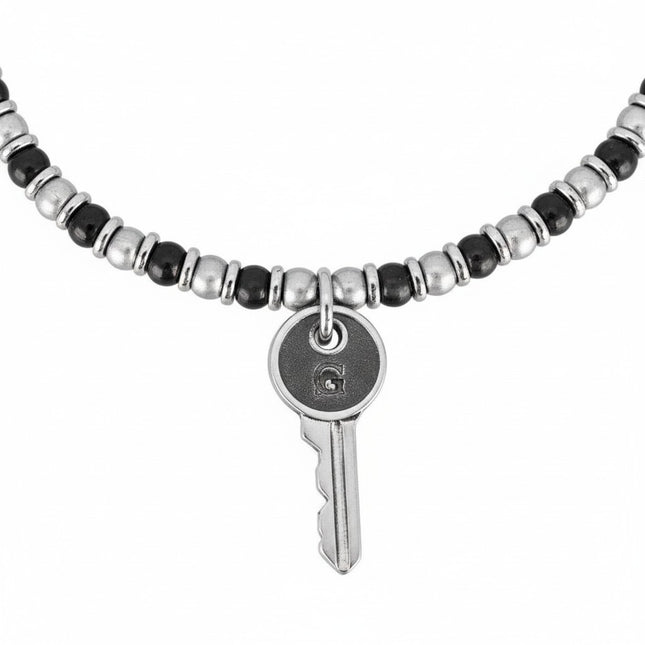 Tempo A Tempo men's steel bracelet with hematite beads and a key charm. Silver and black design with adjustable clasp.