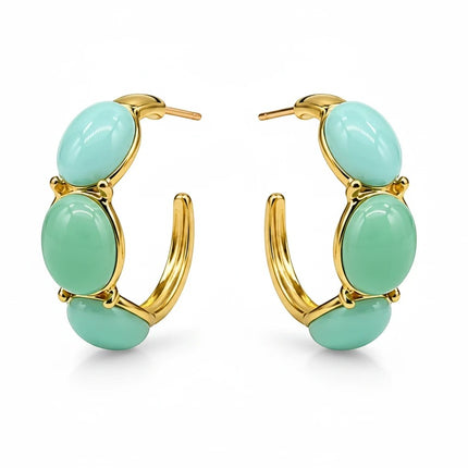 Orecchini a cerchio Tempo A Tempo in acciaio dorato con cabochon in resina verde menta, design moderno ed elegante.