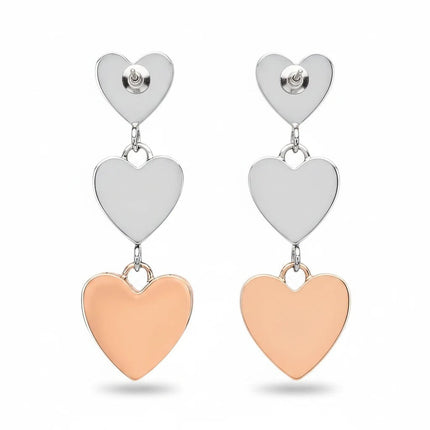 Orecchini pendenti 2Jewels in acciaio PVD rosa e argento con ciondoli a cuore sovrapposti. Design romantico e femminile.
