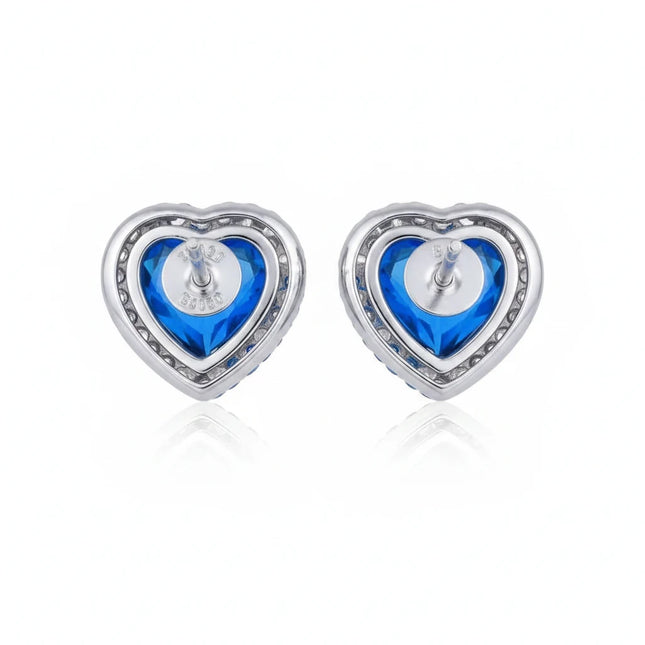 Orecchini Tempo A Tempo Shelly a forma di cuore in acciaio con zirconi halo blu e chiusura a farfalla