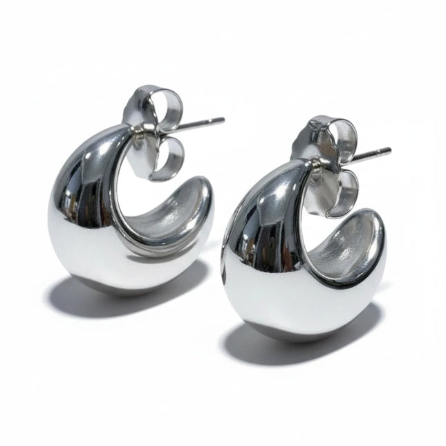 Orecchini Tempo A Tempo Shelly a mezzaluna chunky in acciaio 316L color argento lucido dal design moderno